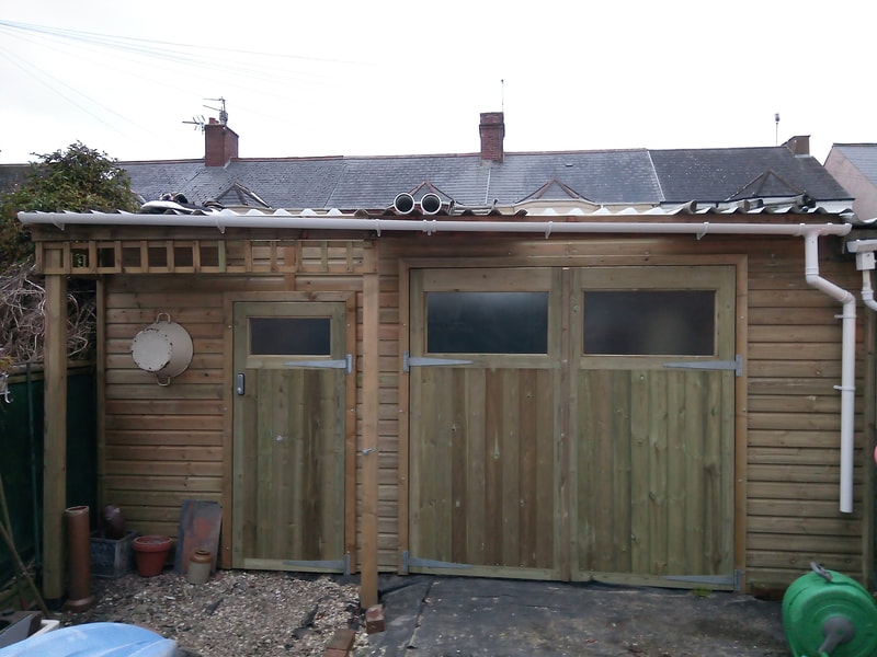 combined timber garage and shed